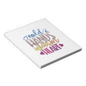 看護師の贈り物 | 冷たい手を温かい心 ノートパッド (アングル)