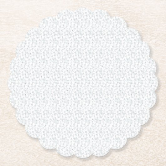 真っ白で特徴のない表面が視界を埋め尽くしている。 ペーパーコースター (正面)