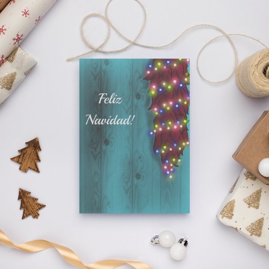 真っ赤なチリのリストラが青いドアのクリスマスイルミネーションに絡まる 招待状