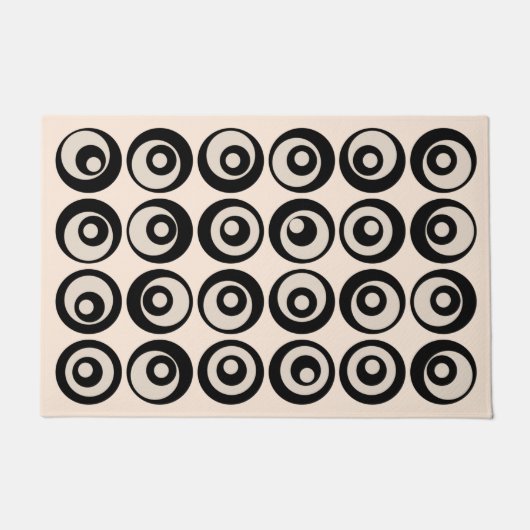 真ん中のモダン丸型黒とクリーム ドアマット (正面)