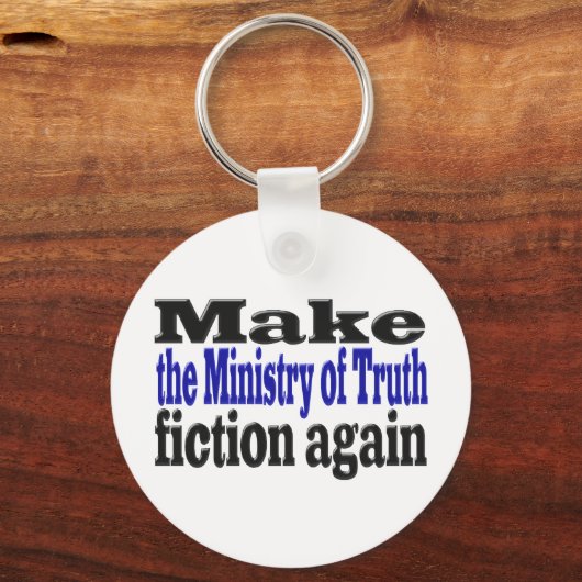 真実省フェイクニュース黒と青の文字 キーホルダー (裏面)