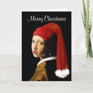 真珠のイヤリングのクリスマスカードを持つ女の子 シーズンカード