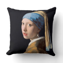 真珠のイヤリングを持つ少女