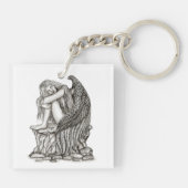 眠れる天使が石の上に キーホルダー (裏面)