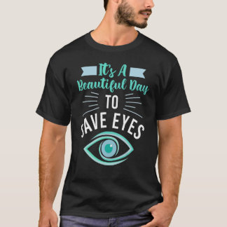 眼科医Optiの美しい救日眼科医 Tシャツ