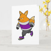 眼鏡とアイススケートでアイススケートを楽しむキツネ カード (黄色い花)