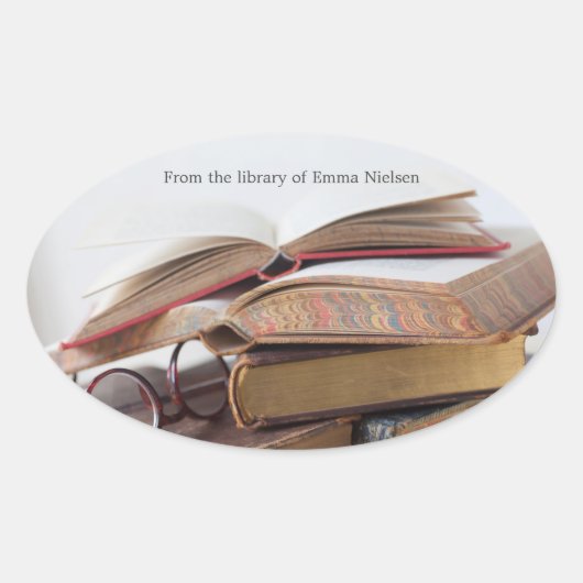 眼鏡をかけた古い本 楕円形シール (正面)