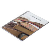 眼鏡をかけた古書 ノートブック (左側)