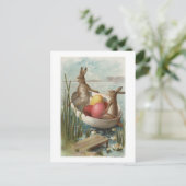 着色された卵が付いているボートのEasterBunnies シーズンポストカード (スタンド正面)