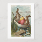 着色された卵が付いているボートのEasterBunnies シーズンポストカード (正面)
