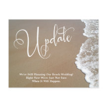 砂と泡の延期されたビーチ結婚式の更新