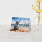 砂の上にコアラビーチメリークリスマス カード (黄色い花)