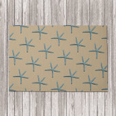 砂の背景に青い指のヒトデ ドアマット