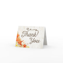 砂浜の貝殻と花の飾りが施された、素朴なビーチスタイルのサンキューカード