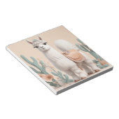 砂漠にサドルを持つラマ ノートパッド (アングル)