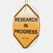 研究の進行中の印 セラミックオーナメント (左)