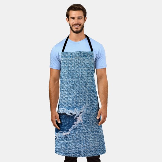破れたデニム生地のテクスチャ、青い色合い。 エプロン (着用した状態)