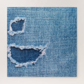 破れたデニム生地のテクスチャ、青い色合い。 ジグソーパズル (縦)