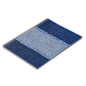 破れたデニム:ブルージーンズの生地。 ノートブック (左側)