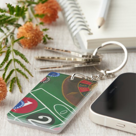 破片および車輪が付いているルーレットのテーブル キーホルダー (正面右)