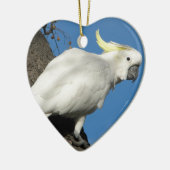 硫黄によって頂点に達されるオウム セラミックオーナメント (左)