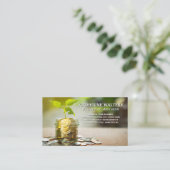 硬貨の瓶に生える植物 | 財務 名刺 (スタンド正面)