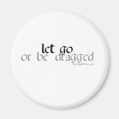 磁石を放すか、引っ張る マグネット (正面)