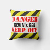 示される子供の危険の印は枕を避けます クッション (裏面)