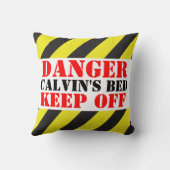 示される子供の危険の印は枕を避けます クッション (裏面)