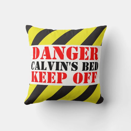 示される子供の危険の印は枕を避けます クッション (裏面)