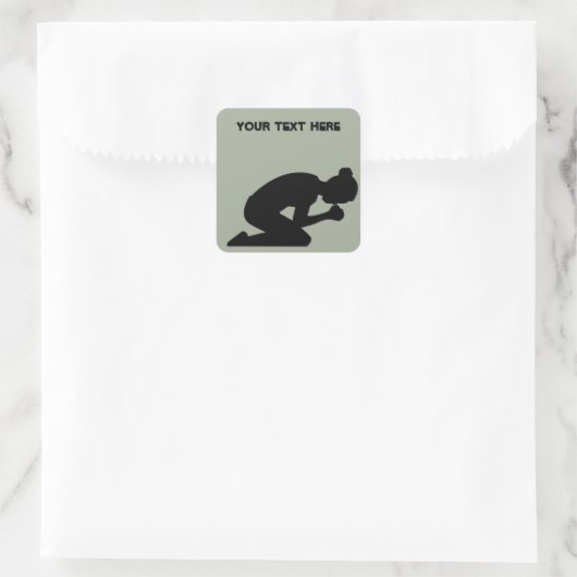 祈りの言葉で膝を曲げる女性の黒いシルエット スクエアシール (バッグ)