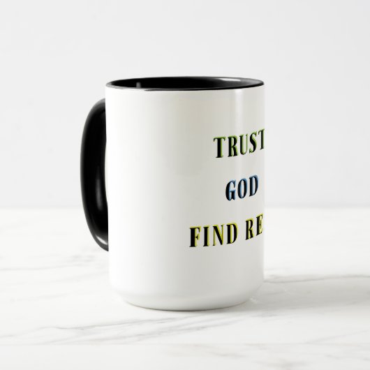 神が安息を得ることを信じる マグカップ (正面左)