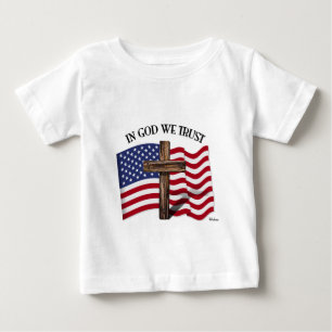 神の中で私たちは険しい十字架と米国旗を信頼する ベビーTシャツ