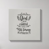 神は支配され、彼のタイミングは完璧な芸術である キャンバスプリント (正面)