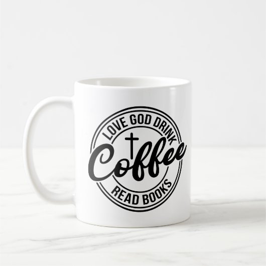 神を愛しコーヒーを飲み本を読む コーヒーマグカップ (左)