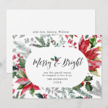 祭りのようなクリスマスの雰囲気を醸し出すポインセチアとミストルテーの写真