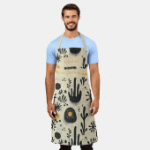 禅フローラキッチン衣服インブラック&オレンジウェルネス エプロン (着用した状態)