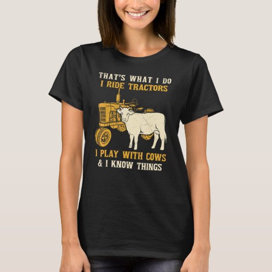 私がすることといえば、トラクターに乗り、牛と遊ぶこと F Tシャツ (正面)