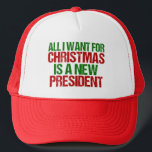 私がクリスマスに欲しいのは新しい社長おもしろいだ キャップ<br><div class="desc">私がクリスマスに欲しいのは新しい社長の帽子だけだ。このPOTUSを刺激し、この抵抗を始めよう。アンチドおもしろいナルドトランプの休日の贈り物に抵抗する緑と赤書の。政治ユーモアの休日の帽子。</div>
