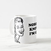 私が陽気であることをだれも知りません コーヒーマグカップ (正面左)