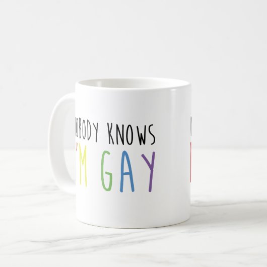 私が陽気であることをだれも知りません コーヒーマグカップ (正面左)