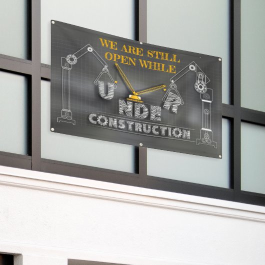 私たちは建築中まだ営業している 横断幕 (ビルの外側)