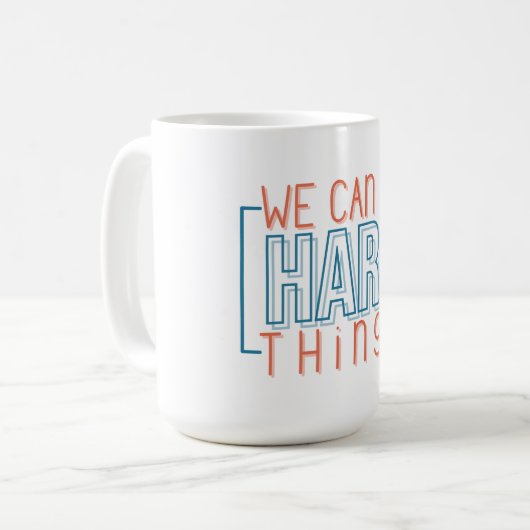 私たちは懸命ができる コーヒーマグカップ (正面左)