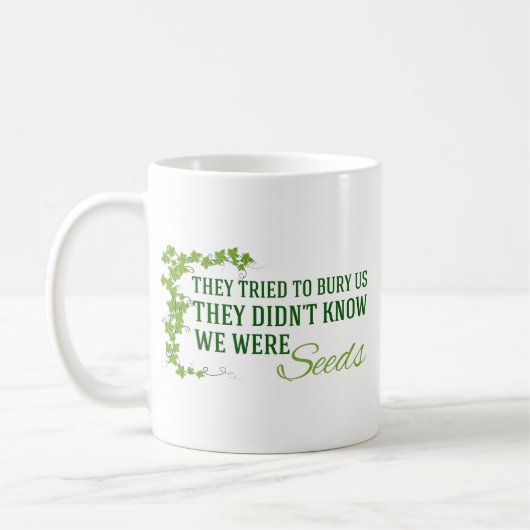私たちは種子感動的引用文 コーヒーマグカップ (左)