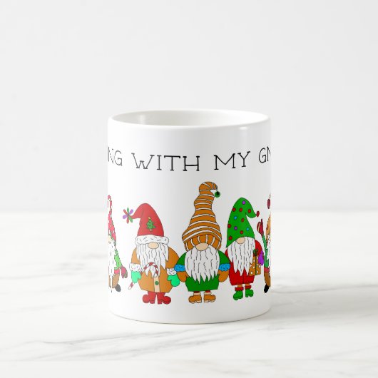 私のぶら下がったグノーミーと コーヒーマグカップ (中央)