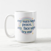 私のオーラは平和を言う、私の顔は私を試してみると言う コーヒーマグカップ (左)