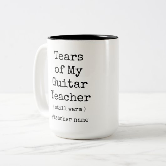 私のギター先生の涙がまだ温おもしろいかい ツートーンマグカップ (正面左)