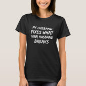 私の夫はあなたの夫が壊すものを固定します Tシャツ (正面)