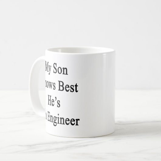 私の息子は彼によってがエンジニアであるベストを知っています コーヒーマグカップ (正面左)