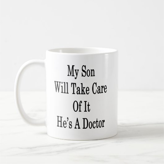 私の息子は彼によってが医者であるそれを大事にします コーヒーマグカップ (左)